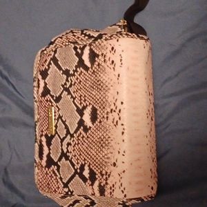 Could be makeup case or utility type bag